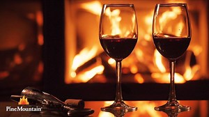 What better way to end a long day than enjoying a glass of pinot by a warm fire. | Pine Mountain® Firelogs