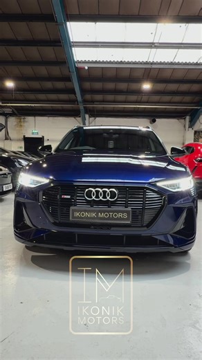Ikonik Motors present this eye-catching 2022 Audi E-Tron, finished in a stunning Navarra Blue, offering a refined all-electric driving experience with all wheel drive, a high quality interior, and Audi’s intuitive dual-screen infotainment system with advanced driver assistance. Accompanied with rear entertainment screens with HDMI inputs. Delivering up to 222 Miles of EPA-estimated electric range on a full charge, a premium electric SUV that blends comfort, performance, and everyday usability. —