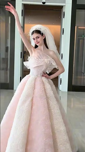 Elegant Blush Pink Bridal Gown with Dramatic Flair