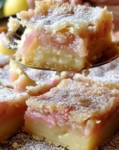 7.9K views | Tangy Rhubarb Lemon Bars INGREDIENTS : 1 cup all-purpose flour 籠 1/2 cup unsalted butter, softened 杻 1 cup granulated sugar  ... 퐅퐮퐥퐥 퐑퐞퐜퐢퐩퐞 퐢퐧 퐂퐨퐦퐦퐞퐧퐭  #RhubarbLemonBars #Dessert #Baking #SweetTreats #Homemade #Delicious #FreshFlavors #SpringDesserts | Cooking With Vibes | Facebook