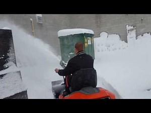 Husqvarna AWD rider Snowblower handling heavy snow
