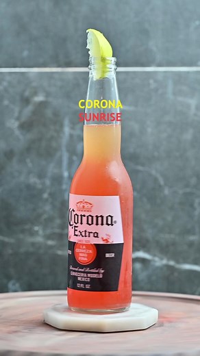 Corona Sunrise is an amazing cocktail with beer! The combination of beer 🍺, tequila 🥃, orange juice 🍊, and lime 🍋 is just delicious! 😍 Recipe: \t•\t1 bottle of Corona (drink to the label 🍻) \t•\t2 oz. of Patron Tequila \t•\t2 oz. of Orange Juice \t•\t1/2 oz. of Grenadine \t•\tSqueeze of Lime 🍹 #cocktail #bar #bartender #bartenderlife #cocktailsrecipe #cheers #beer #corona #tequila #grenadine #orangejuice #limejuice #coronasunrise #lime #beercocktaul #summerdrink@Corona Mx