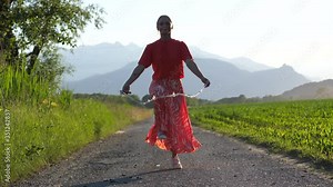 Young Beautiful Girl Jumping the Rope