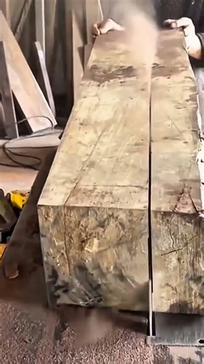 The Process of Cutting Large Wooden Beams with a Bandsaw for Precision
