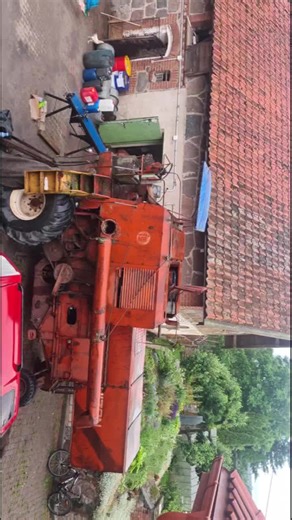 Restoring an Old Tractor in a Rural Backyard Setting