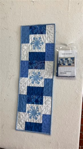 The winter table runner is ready to go ❄️ This $40 kit includes the appliqué snowflakes and the backing—perfect for adding a seasonal touch to your table | The Cherry Pit