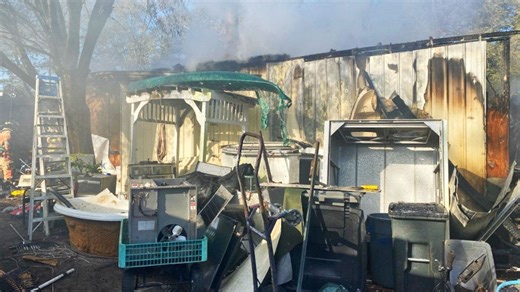 Firefighters prevent house fire from spreading to neighboring homes