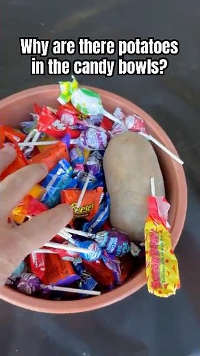 Potato In Halloween Candy Bowl!