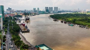 Saigon river along Ho Chi Minh City downtown, Vietnam time lapse
