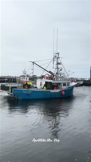 Fishing boat “Time and Tide” approaching slowly on the port side to unload lobster cages