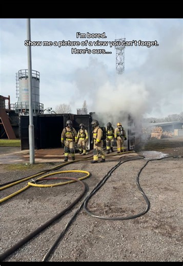 Hmmmm we definitely don’t get bored of this view 😍 (Visual description: a Live Photo of Lancashire Firefighters walking out of a training session wearing Breathing Apparatus, with text on screen saying “