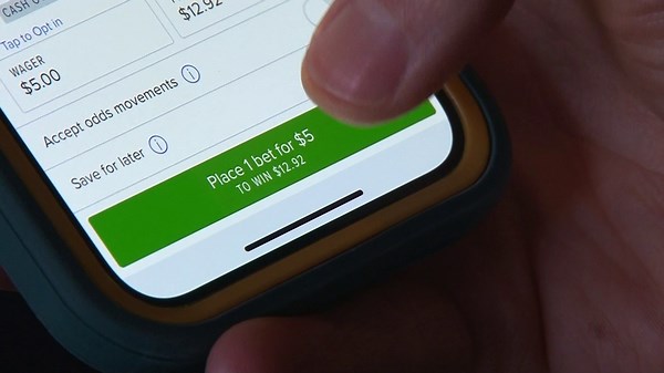 Mobile sports betting, 'risk-free' ads play on worst parts of gambling addiction, experts says