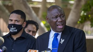 Hotel worker held at gunpoint by police hires attorney Benjamin Crump, seeks $2.5 million