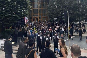 Police officers injured during clashes with protesters