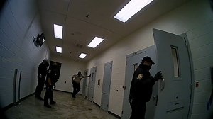 Sex assault suspect was restrained in a chair and pushed into a shower stall with hot scalding water