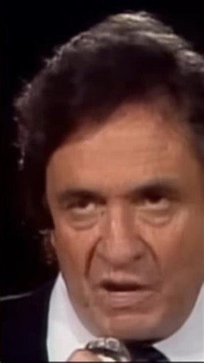 Johnny Cash performing how great thou art