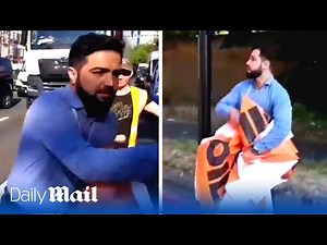 Man furiously shoves Just Stop Oil protestors for blocking ambulance