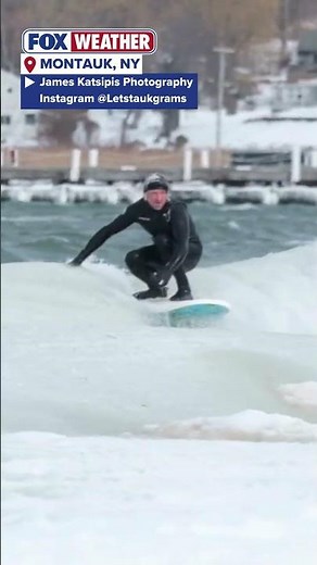 Surfers Take On Frozen Waves In Montauk, NY