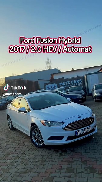 FORD FUSION Hybrid 2.0 An fabricație: 2017 Motorizare: 2,0 cmc Atkinson-cycle I4 ( HEV ) Kilometraj: 160 798 km Cutie de viteze: Automată Dotări principale: Sistem de climatizare automată pe 2 zone Cameră pentru marșarier Sistem multimedia Keyless go / Keyless entry Geamuri electrice, oglinzi electrice Scaune față cu reglaje electrice Volan multifuncțional Frână de mână electrică Funcție „Follow me home” Cotieră Port USB Sistem de frânare ABS, frânare de urgență, airbaguri multiple incluse: fron
