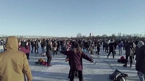 Dutch dance on frozen lake despite lockdown