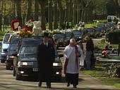 Charlie Kray funeral; ITN EXT Funeral cortege towards Reggie Kray...