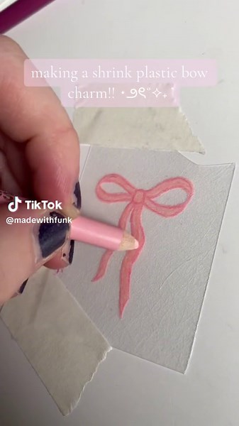 making shrinky dink charms with new paper so i’m still figuring out how the colours bake and sizing!! i’m making more bows to turn into keychains and other things ⋆౨ৎ˚⟡˖ ࣪ #bows #shrinkplastic #charms #jewelry #handmadejewelry #smallbusiness #jewelrybusiness #fyp #foryou #fy #fypシ #madewithfunk