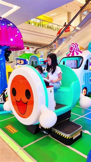 Fun Time on a Cute Drum Kiddie Ride