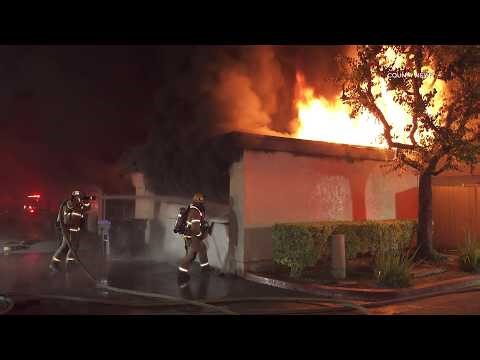 Fire Rips Through Garages, Destroys Vehicles | Santa Ana, CA