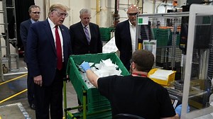 Trump tours, touts mask factory — but no mask for him