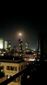 7.6K views · 112 reactions | #BREAKING Video: Rocket interceptions over Tel Aviv following a massive barrage rocket attack across Central Israel from Gaza. Reports of 1 man in critical condition in Holon. | StandWithUs | Facebook