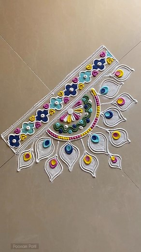 860K views · 1K reactions | Peacock feather inspired rangoli design! #creative #rangoli #ideas #relaxing #rangoliart #festivities #rangolidesigns #festive #homedecor | Blissful Stuff by Poonam | Facebook