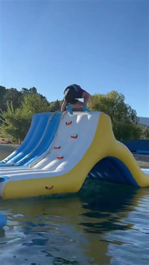 Girl beats boys on giant inflatable obstacle course!
