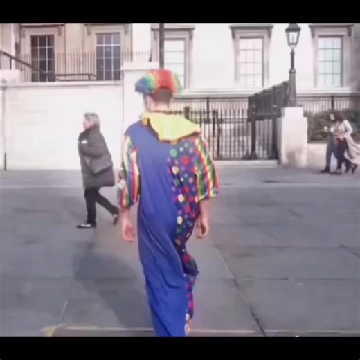 Colorful Clown Performance in Urban Environment