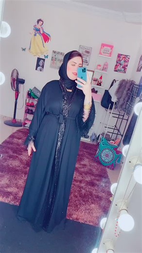 Elegant Fashion Display with Dark-Colored Robe