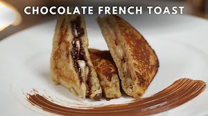 Ingredients: 4 Slices Of Bread 1 Banana 1 Cup Milk 1 Egg 1 Tbsp Honey 1/2 Tsp Vanilla Essence Salt To Taste Chocolate and Spread Peanut Butter 1 Tsp Butter Method: to make the mixture for dipping the sandwich pour some milk in a bowl and add and egg, honey, vanilla essence and whisk it lightly. Cut the sides of the breads and make the sandwiches with Peanut butter, Chocolate and hazelnut spread, Bananas or fruits of your choice. Add some butter to the hot pan, dip the sandwiches in the milk mixt