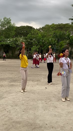 Marching Band Practice: Drummers and Majorettes Unite