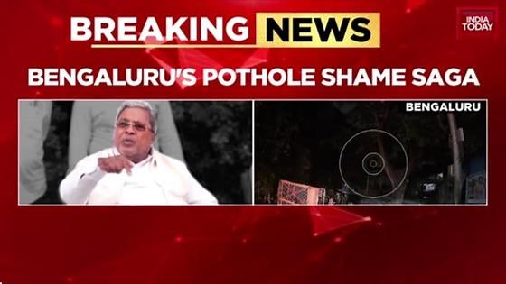 Bengaluru pothole saga continues as auto-rickshaw topples on road