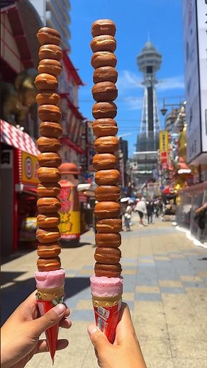 まるで通天閣みたいな巨大ベビーカステラ串！焼きたてモチモチで食べ歩きにピッタリ【甘々堂：大阪新今宮】
