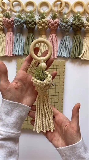 Megan | Macrame Gifts & Tutorials on Instagram: "Macrame Plant Pod 🤍✨ #handmademarket #behindthescenes #howto #macrame #megsmodernmacrame #shopmegsmodernmacrame #macrameshop #handmadecommunity #macramemakers #macramegift #macrameidea #diy #keychains #howtomacrame #gatheringknot #beginnerknot #beginnermacrame #beginnerartist #macramemovement #fiberart #keychaindiy #macramebraid #macramekeychain #macramecharm #fiberart #macramechristmas #relaxingtutorial #shophandmade #farmersmarket #macramemarke