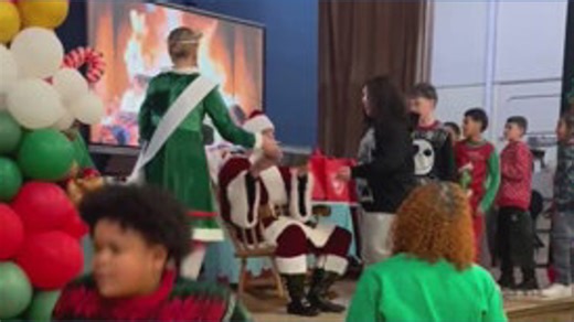 Totally Buffalo Cares and Santa deliver gifts to students at Hyde Park Elementary School in Niagara Falls, NY