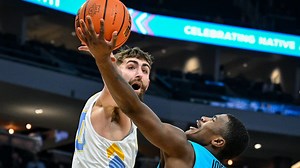 An artist in the paint: How Marquette's Kam Jones learned creative ways to score around basket