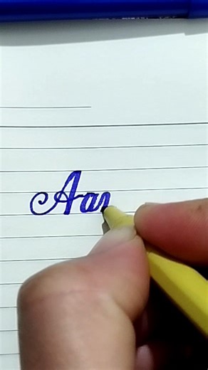"Aanya" in cursive writing#Cursive Writing| Calligraphy|Cursive Lettering#ytshorts#viral#abcd #reels
