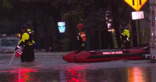 Video shows flood rescues, cars stranded as heavy rains slam Northeast