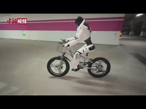 上海科技企业发布新款人形机器人 能骑自行车可与人交互