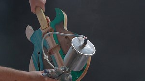 Electric guitars made out of recycled skateboards?! 🎸 #HowItsMade | Discovery Channel UK