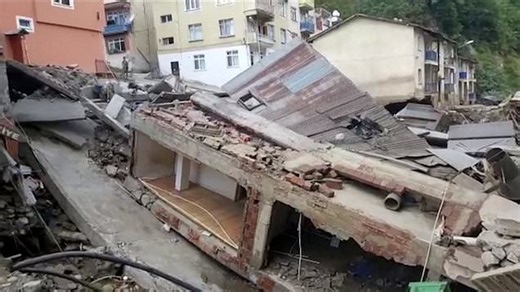 Flash flooding in Turkey brings down buildings, buries vehicles