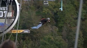 Video. Dozens leap off bridge in Sochi annual base jump festival