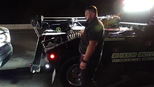 While You Are Sleeping: Local tow truck owner on call 24/7 to help drivers during roadside emergencies