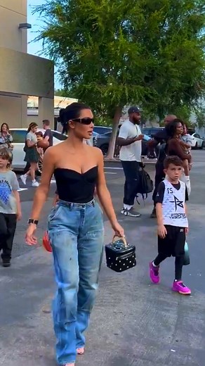 1.9M views · 676 reactions | Kim Kardashian leaves with her son, Saint, after his basketball game, takes him and his friends to dinner. | Meme Girls | Facebook
