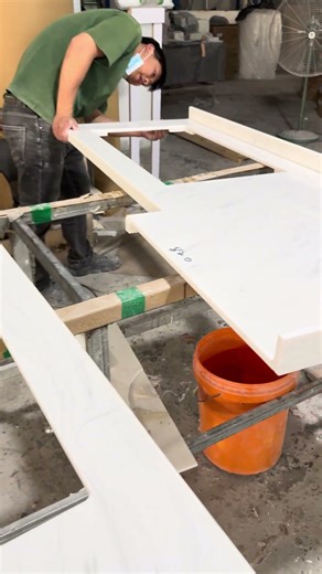Polishing Solid Surface Kitchen Countertops.